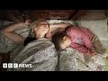 Family secretly film life in russianoccupied ukraine  bbc news