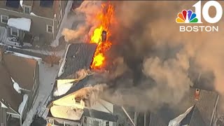 Crews battle massive house fire in Lynn