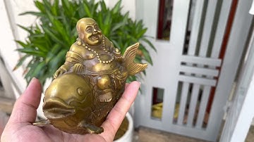 Tượng di lặc cưỡi cá chép bằng đồng DxC 14x13cm 0 8kg 38