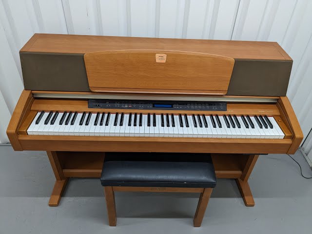 Yamaha Clavinova CLP-970 digital piano and stool in cherry wood