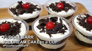 Fudgee barr ice cream cake - a decadent layers of moist chocolate with
sweetened topped shavings and cherries. #fudgeebari...