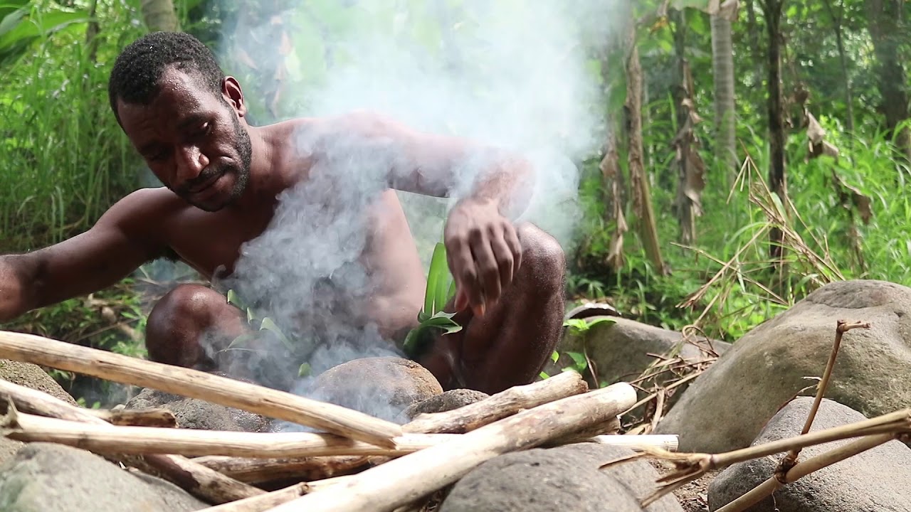 video editing software free Tribal man primitively survives in the Jungle: Catching Fish, Cook, and Eat it for Lunch