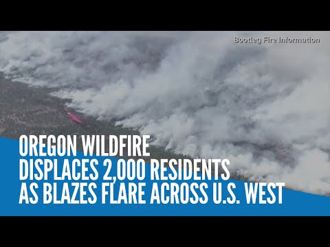 Oregon wildfire displaces 2,000 residents as blazes flare across US West