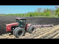 Tractors plowing harrowing  planting onions