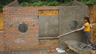 Construction genius 20 year old girl: Building bricks house - Apply the cement coat to the wall
