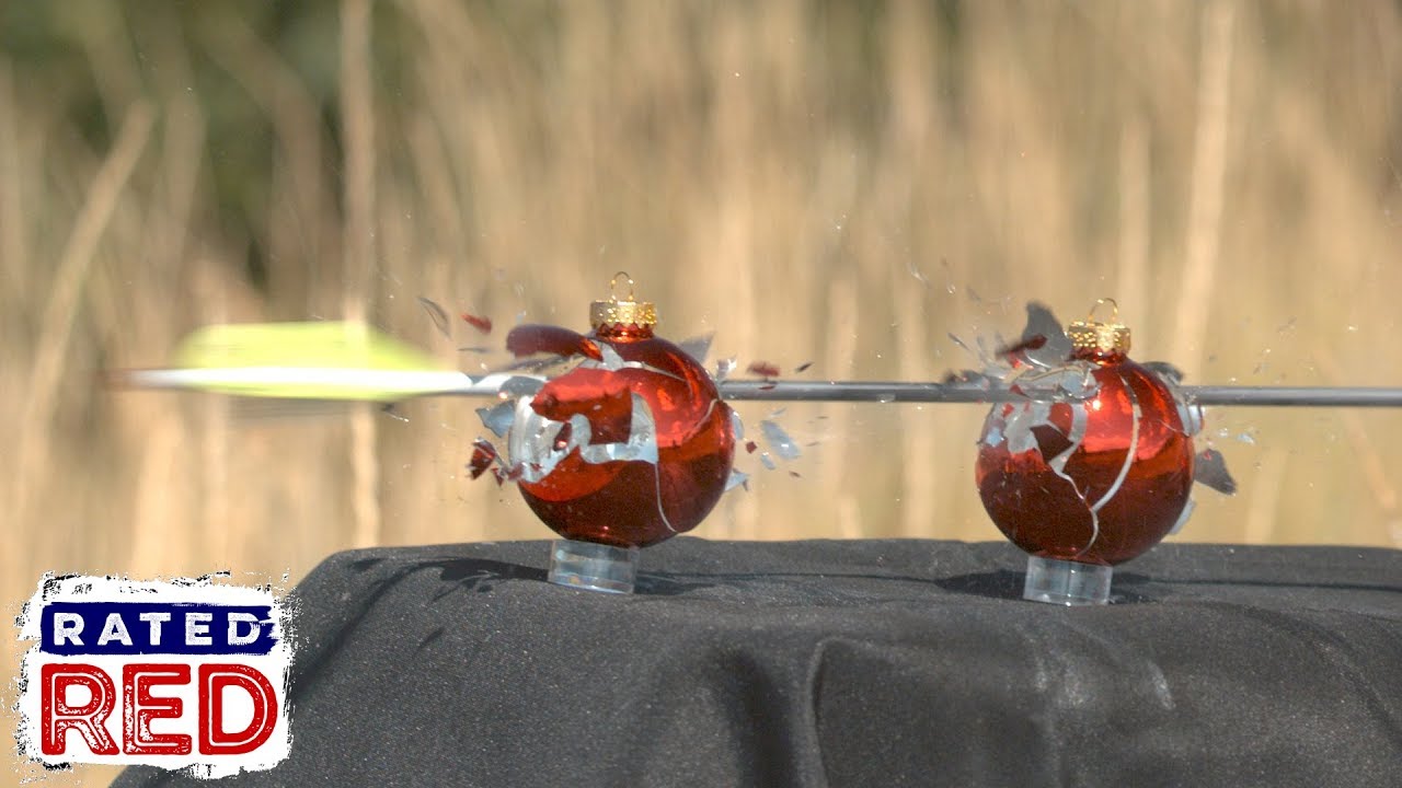 Cam Hanes Takes an Arrow to Some Leftover Christmas Ornaments