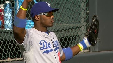 Puig makes outstanding catch, turns two
