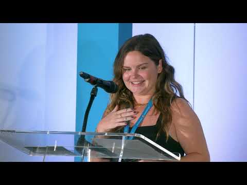 ApartmentGeofencing.com's VP of Digital Marketing, Charlotte Barter, accepts award for #1 place in nationwide Multifamily Program