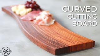 Learn how to make this DIY curved cutting board using bent lamination. Bending wood with this woodworking technique is easier 