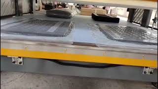 Compression packing machine for compressing and packing two pillows at the same time