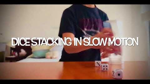 Dice Stacking in Slow Motion