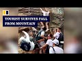 Chinese tourist survives fall from steep mountain steps