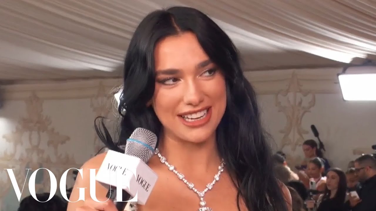Dua Lipa saving the met gala: Fans react to the pop star's vintage Chanel  gown for Met Gala 2023