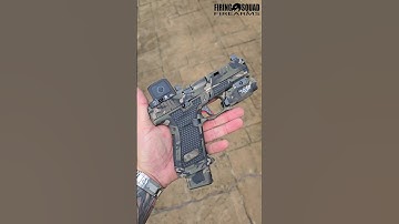Gen 5 Glock 19 customized by Firing Squad Firearms. Trijicin rcr tlr7x Overwatch Tac camo cerakote