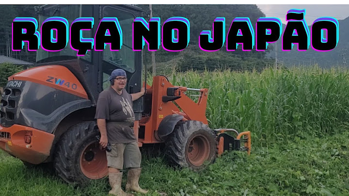 WORKING ON THE FIELD IN JAPAN WITH A TRACTOR