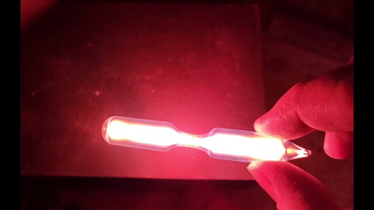 Neon discharge tube excited by a tesla coil.