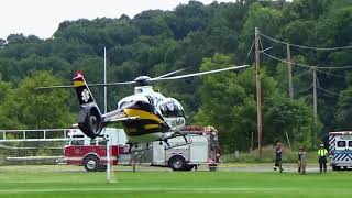 Medical Helicopter Lands On Soccer Field. EC-135 Airbus STAT MedEvac Helicopter Landing and Takeoff.