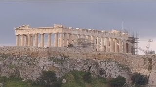 France backs Greek austerity delay - at a price