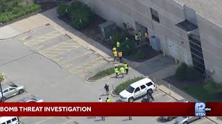 There is a bomb threat investigation taking place at a Menomonee Falls business