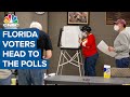 Florida voters head to the polls in a must-win swing state for President Donald Trump