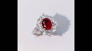 This stunning oval-cut lab-created ruby ring is crafted in rhodium-plated 925 sterling silver