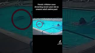 Heroic children save drowning seven-year old as unware adult swims past