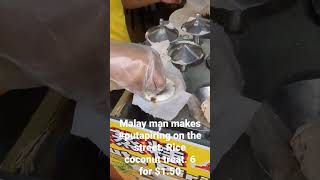 Malay Man Makes Puta Piring A Sweet Rice Coconut Street Food Treat In Melaka Malaysia