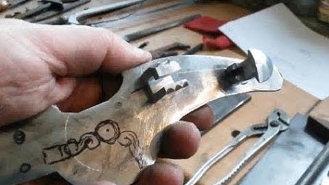 Wheellock pistol build 1650 pt.7 making the spring fixation and rividing into place