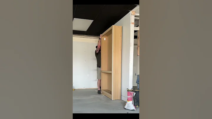 With just one heavy-duty slide + a pair of pulleys, you can have a sliding cabinet hidden door