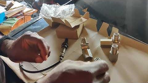 O2 sensor spacers with catalytic converter