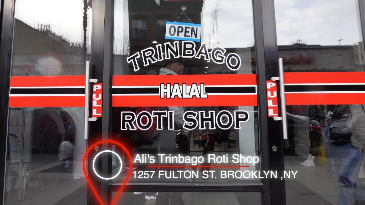 Eating at Ali's Trinbago Roti Shop in Brooklyn, NY - YouTube