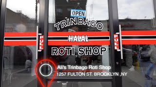 Eating at Ali's Trinbago Roti Shop in Brooklyn, NY