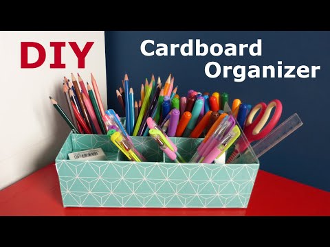 Crayon organizer made of paper rolls and cardboard. Paper DIY