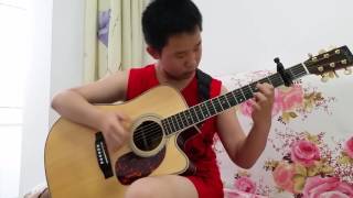 12 Year-Old Self-taught Chinese Guitar Prodigy Plays AC/DC's Thunderstruck