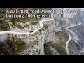 A wallhung road found on a 100meterhigh cliff in henan china