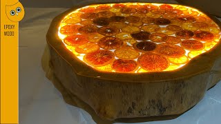 Orange slices in resin? This wood slice coffee table is out of this world! 🍊🍊