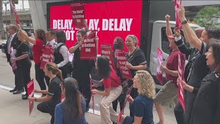 United flight attendants rally outside San Diego International Airport during busy Labor Day travel