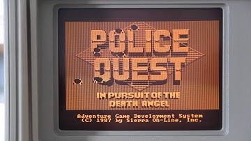 IBM Portable PC 5155 & Police Quest on an amber screen