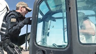 CRAZY GUY ON A BOBCAT TAKEN DOWN