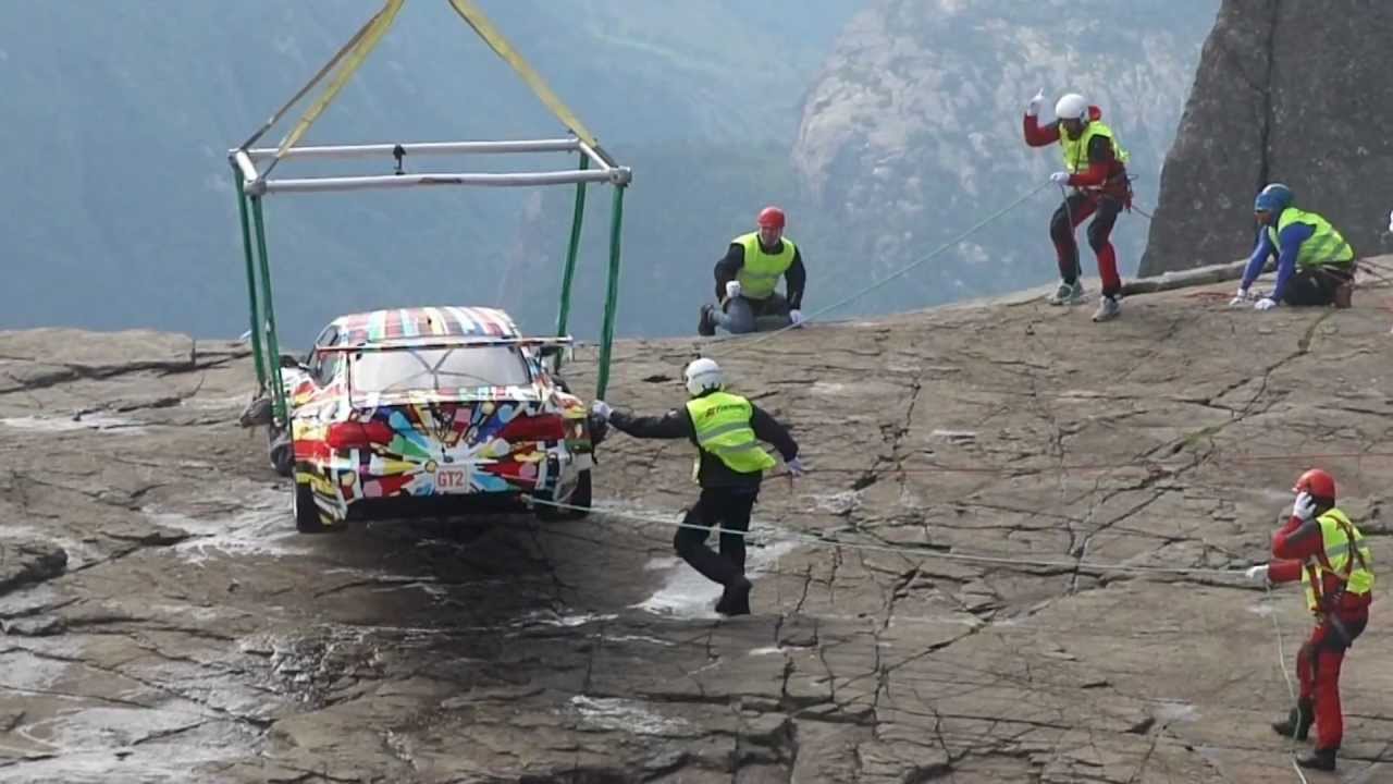 Spy shots of BMW Art Car: M3 GT2 by Jeff Koons on Pulpit Rock (Preikestolen), Norway