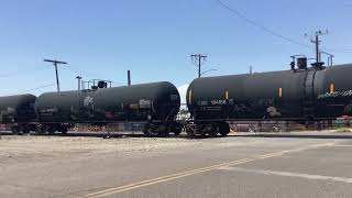 UP 1377 and 4525 pull a string of cars at 20th Street crossing