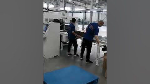 Folder Gluer with feeder, robot arm palletizer together working