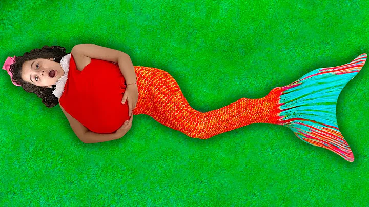 SARAH pretending to be a mermaid who ate too much