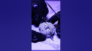 Cutting a silver ash lump with surreal precision #ai #asmr #abstract