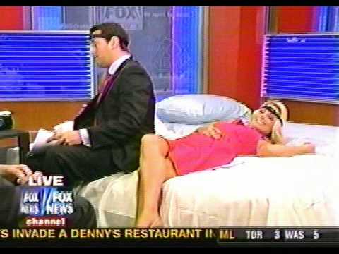 Courtney Friel sticks out tongue - Handling TheTease Fox News Sunday 06 21 2009