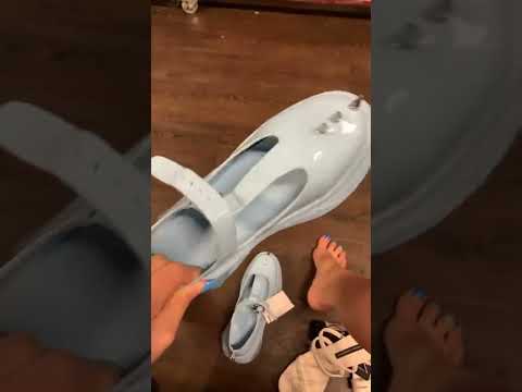 Trying on sandals heels boots in Tk MAXX