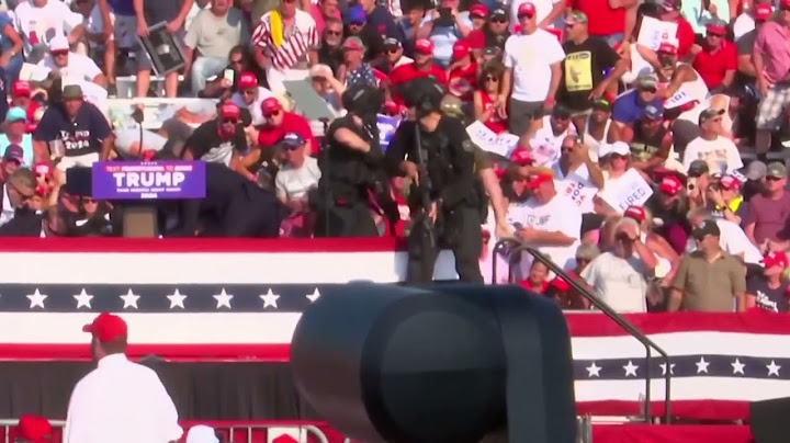 Trump shot on side of the head in apparent assassination attempt.