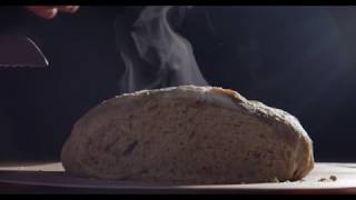 How to Make A Simple Sourdough
Over the past month, baking sourdough has been my jam.
In all honesty if you can make bread just after watching this video alone Ill be amazed.
Just so yah dont leave hungry, heres the recipe I use:
To grow: know how much starter you have (Exact Weight). Plastic wrap on top and poke a few holes so it can breath. Add equal parts of whole wheat flour water, and let it sit for a few hours. Once you have 150 grams of starter, you’re ready to make a loaf. Only need a spoonful leftover.
Separate 150 grams into a bowl and add 300 grams of water (should float to top) gentle stir and leave it. In separate bowl add 530 grams of flour, and 8 grams of salt. Whisk up. Then add the starter water mix. Big sticky ball of dough. Cover it with a towel and let rise for a few hours.
Shape into ball and flour up. Scoop and pull underneath itself. Take another bowl and flour it, put flour on ball, then put a towel on top and then toss it in the fridge overnight.
Turn oven on and stick a pot in there to preheat (450), then dump the dough into the pot, and score the top. Put a lid on, bake for 30 min, remove lid and bake for 20 min. Let it cool for 30 min. How to Make A Simple Sourdough