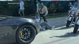 New released of NFL star Tyreek Hill being detained by police in Miami