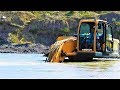Excavator Deep Digging Sand From The River Hyundai R220-9S Doosan DX225LCA